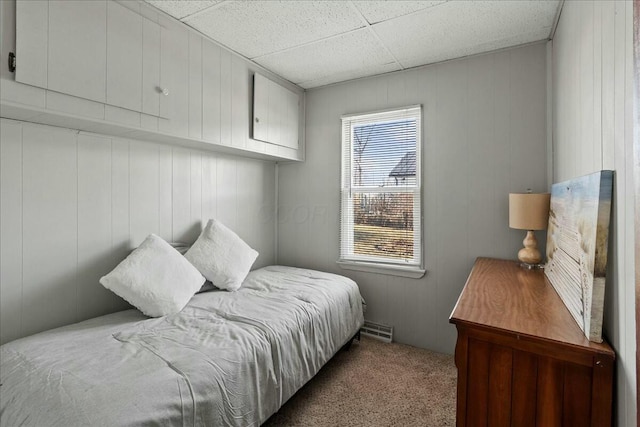 carpeted bedroom featuring visible vents