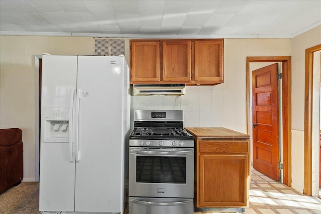 kitchen featuring extractor fan, light floors, brown cabinets, white fridge with ice dispenser, and stainless steel gas range