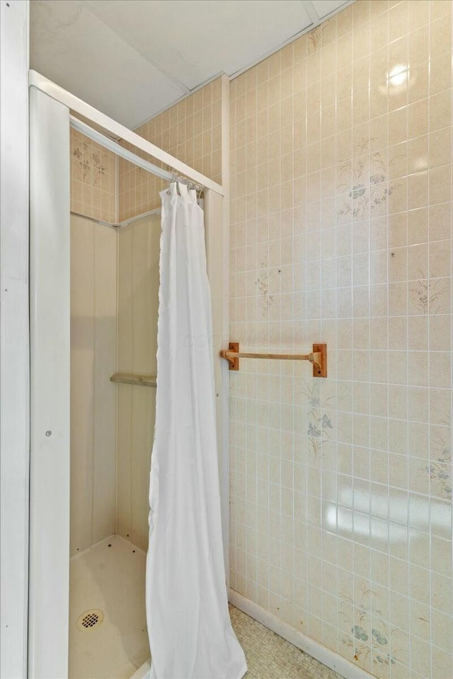 bathroom featuring a stall shower