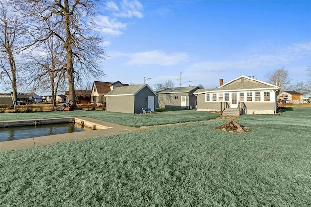 view of yard with an outbuilding and a storage unit