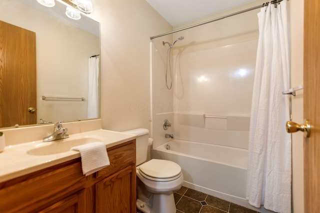 full bath with vanity, tile patterned floors, toilet, and shower / bath combo with shower curtain