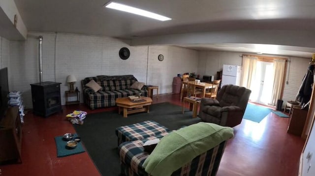 living room featuring a wood stove