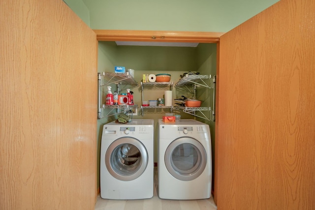 laundry area with washing machine and dryer and laundry area