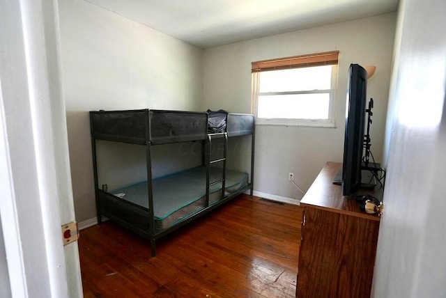 1664 Deporres Dr, Columbus, OH 43219 - bedroom with visible vents, hardwood / wood-style flooring, and baseboards