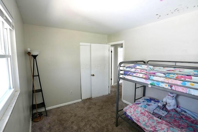 1664 Deporres Dr, Columbus, OH 43219 - bedroom with carpet flooring and baseboards