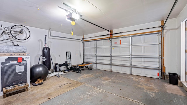 garage featuring a garage door opener