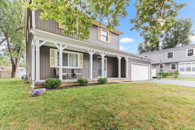 traditional-style home featuring board and batten siding, aphalt driveway, a porch, and an attached garage