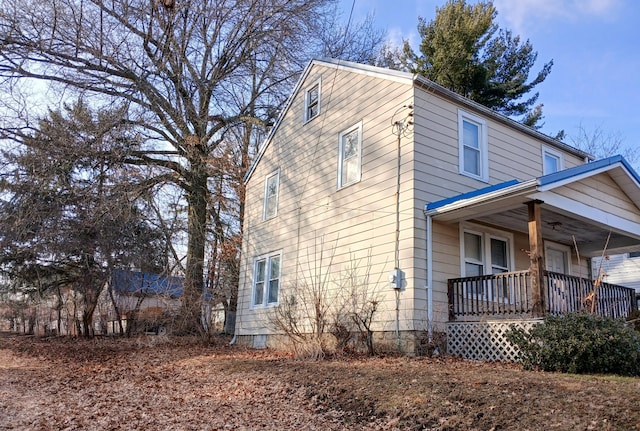 view of home's exterior featuring covered porch