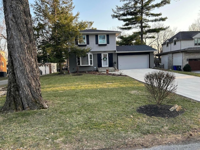 traditional home featuring an attached garage, concrete driveway, and a front lawn