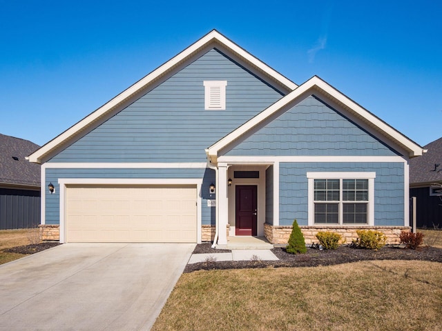 view of front of house featuring stone siding, driveway, and a front lawn