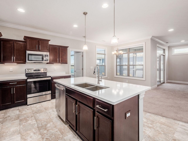 kitchen featuring a sink, stainless steel appliances, crown molding, and light countertops