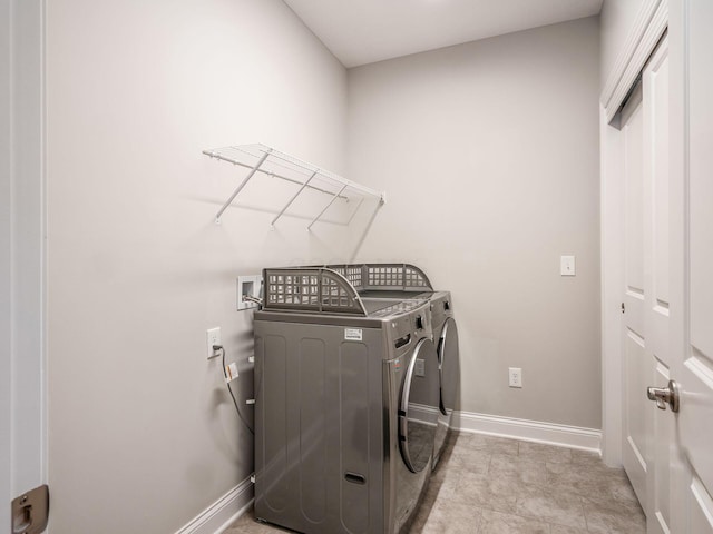 5678 Arcadian Ave, Hilliard, OH 43026 - washroom with baseboards, independent washer and dryer, and laundry area