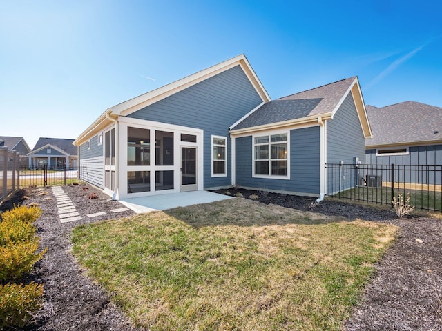 5678 Arcadian Ave, Hilliard, OH 43026 - rear view of house with fence private yard, a sunroom, and a yard