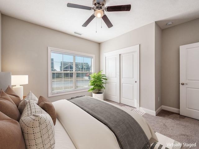 5678 Arcadian Ave, Hilliard, OH 43026 - carpeted bedroom with baseboards, visible vents, and a ceiling fan