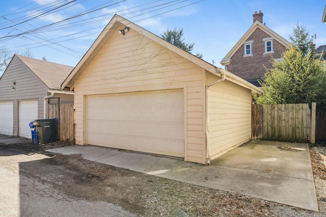 detached garage with fence