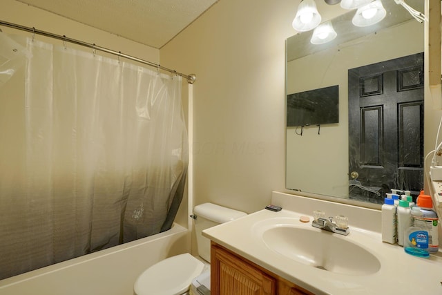 bathroom with shower / bathtub combination with curtain, toilet, vanity, and a textured ceiling