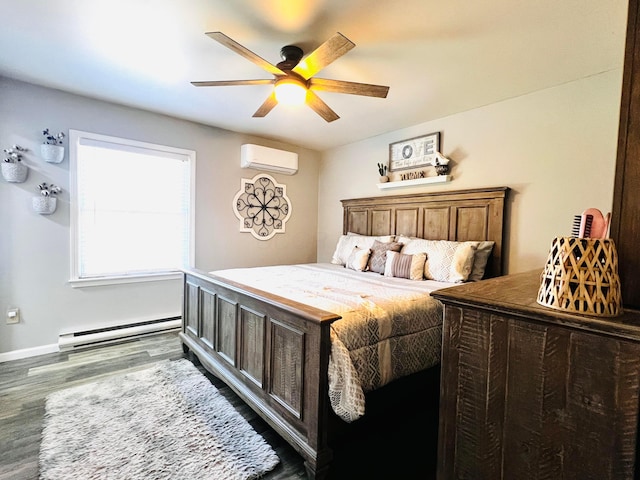 bedroom with a baseboard heating unit, baseboards, ceiling fan, wood finished floors, and a wall mounted AC