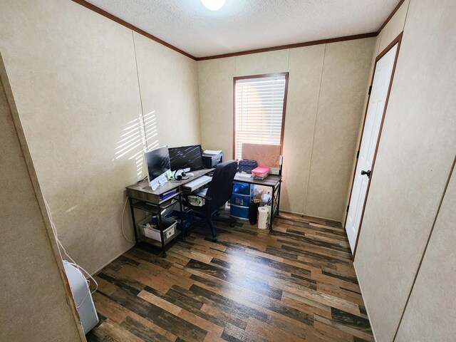 office with a textured ceiling, wood finished floors, and ornamental molding