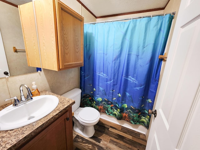 full bath with toilet, a textured ceiling, vanity, and wood finished floors