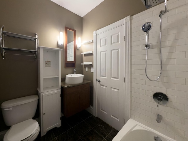 bathroom featuring vanity, toilet, and shower / washtub combination