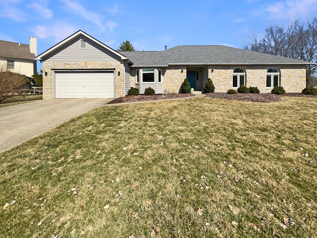 ranch-style home with a front yard, an attached garage, and driveway