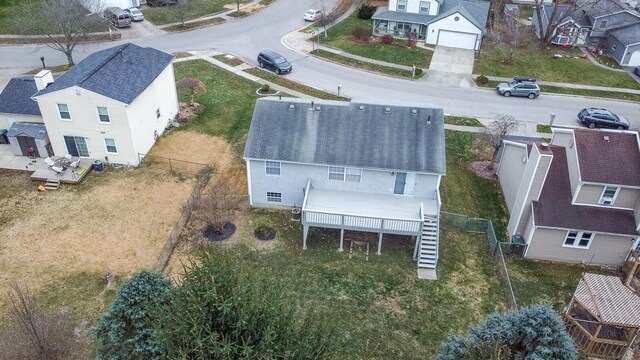 birds eye view of property with a residential view