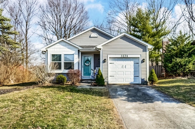 view of front facade featuring driveway, an attached garage, a front lawn, and fence