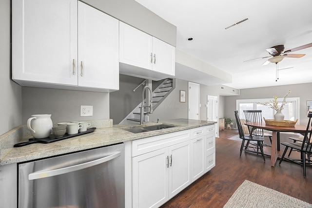 kitchen with visible vents, ceiling fan, a sink, dark wood-type flooring, and dishwasher