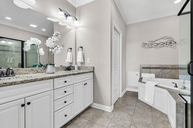 bathroom featuring a sink, a shower stall, ornamental molding, and tile patterned floors