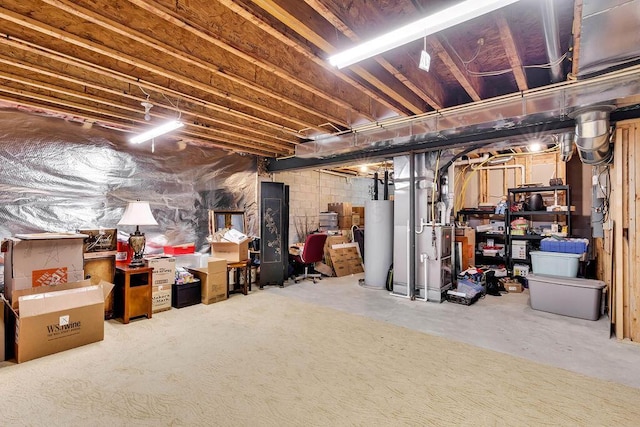 unfinished basement featuring water heater