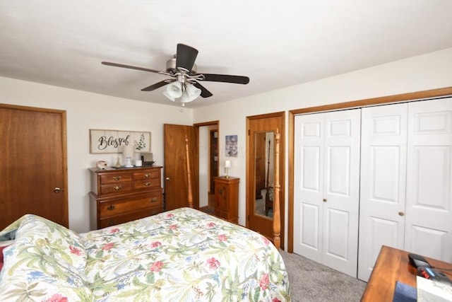 bedroom with a closet, a ceiling fan, and carpet