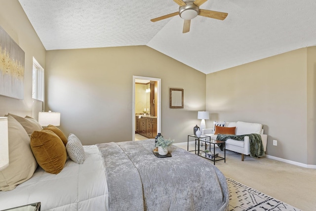 carpeted bedroom with ceiling fan, a textured ceiling, baseboards, and lofted ceiling