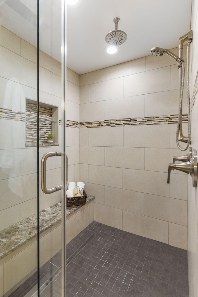 full bathroom with a shower stall