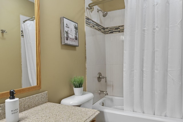 bathroom with toilet, vanity, and shower / bath combination with curtain