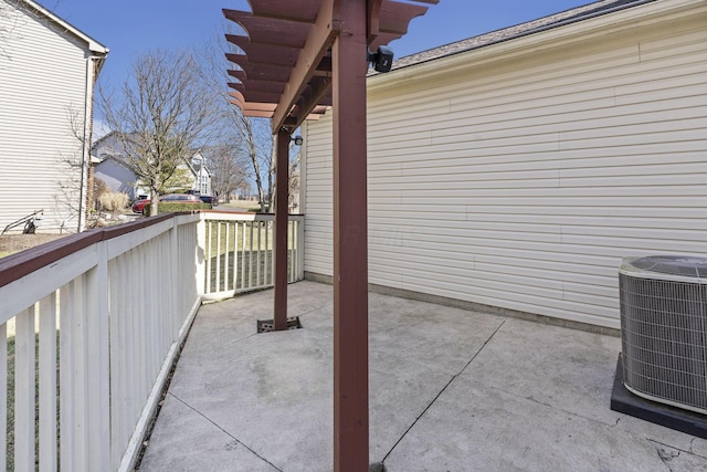 view of patio with central AC