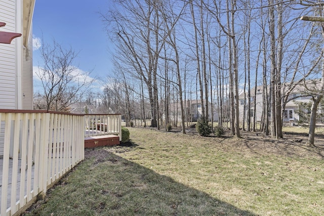 view of yard featuring a wooden deck