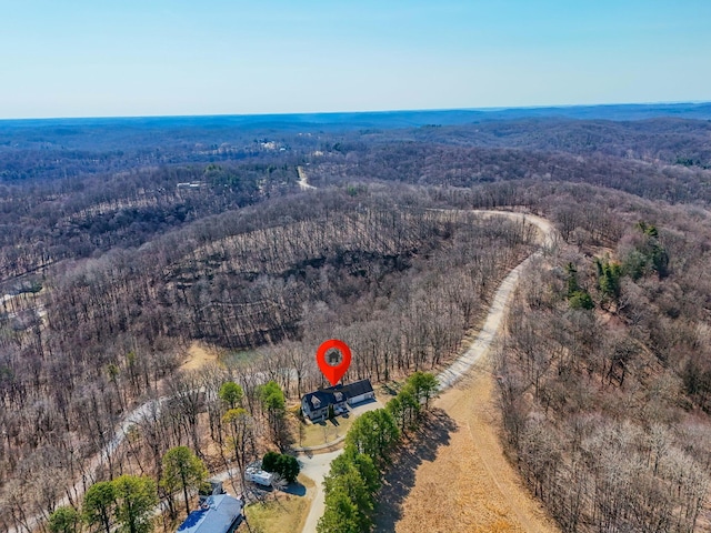 bird's eye view featuring a view of trees