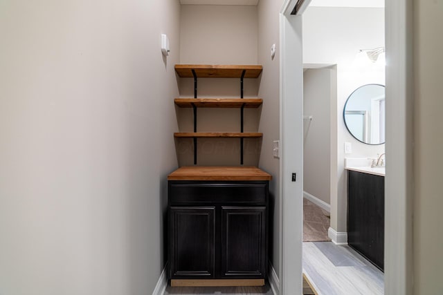 interior space featuring baseboards