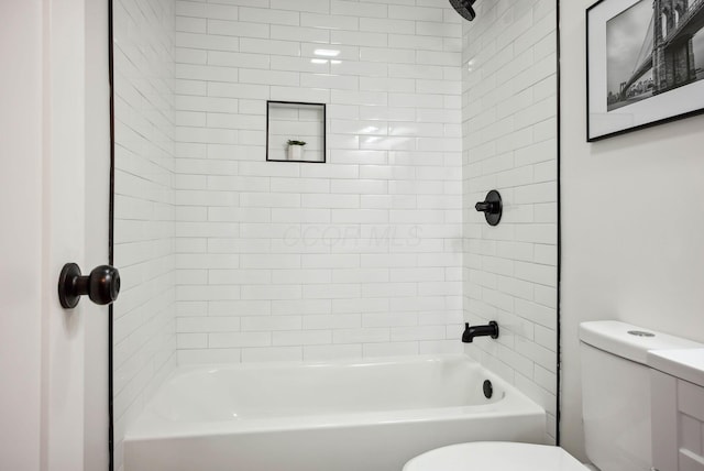 full bathroom featuring toilet and bathing tub / shower combination