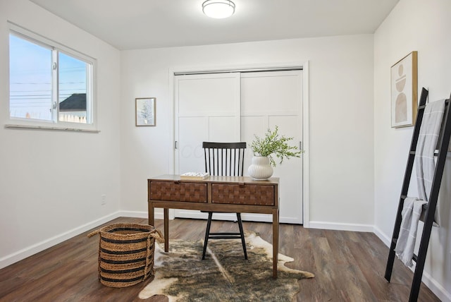 home office featuring wood finished floors and baseboards