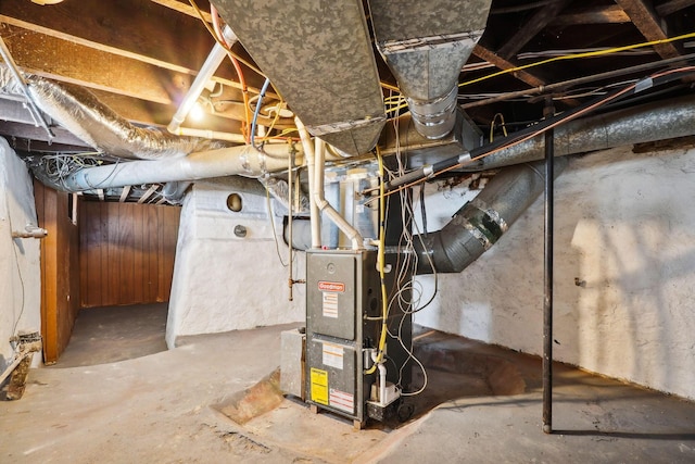 utility room with heating unit