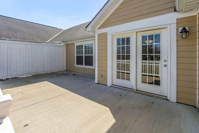 wooden terrace featuring fence