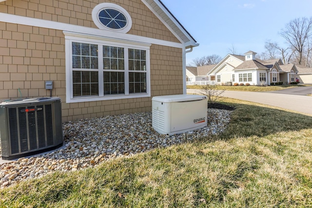 details with central air condition unit and a power unit