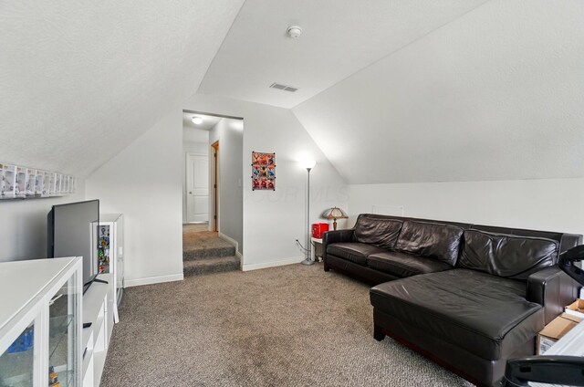 359 W Waterloo St, Canal Winchester, OH 43110 - living area with carpet floors, lofted ceiling, and baseboards