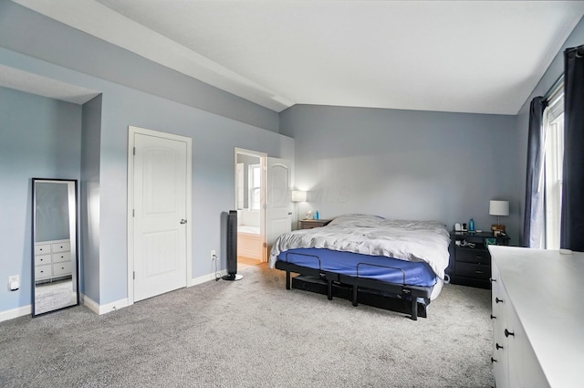 359 W Waterloo St, Canal Winchester, OH 43110 - carpeted bedroom with lofted ceiling, baseboards, and ensuite bath
