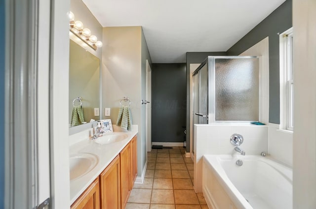359 W Waterloo St, Canal Winchester, OH 43110 - bathroom with a shower stall, tile patterned flooring, a garden tub, double vanity, and baseboards