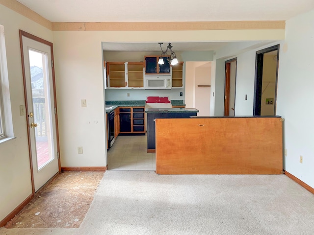 kitchen with open shelves, dark countertops, baseboards, white microwave, and dishwasher