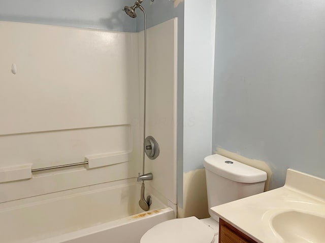 full bathroom featuring shower / washtub combination, toilet, and vanity