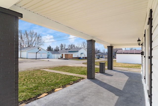 view of patio with a residential view