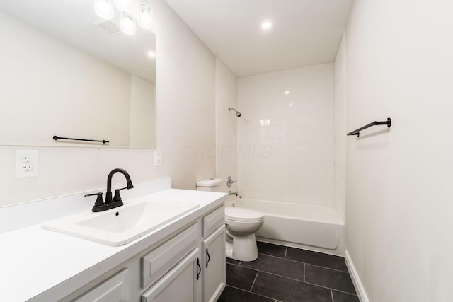 bathroom with toilet, tile patterned flooring, baseboards, bathing tub / shower combination, and vanity